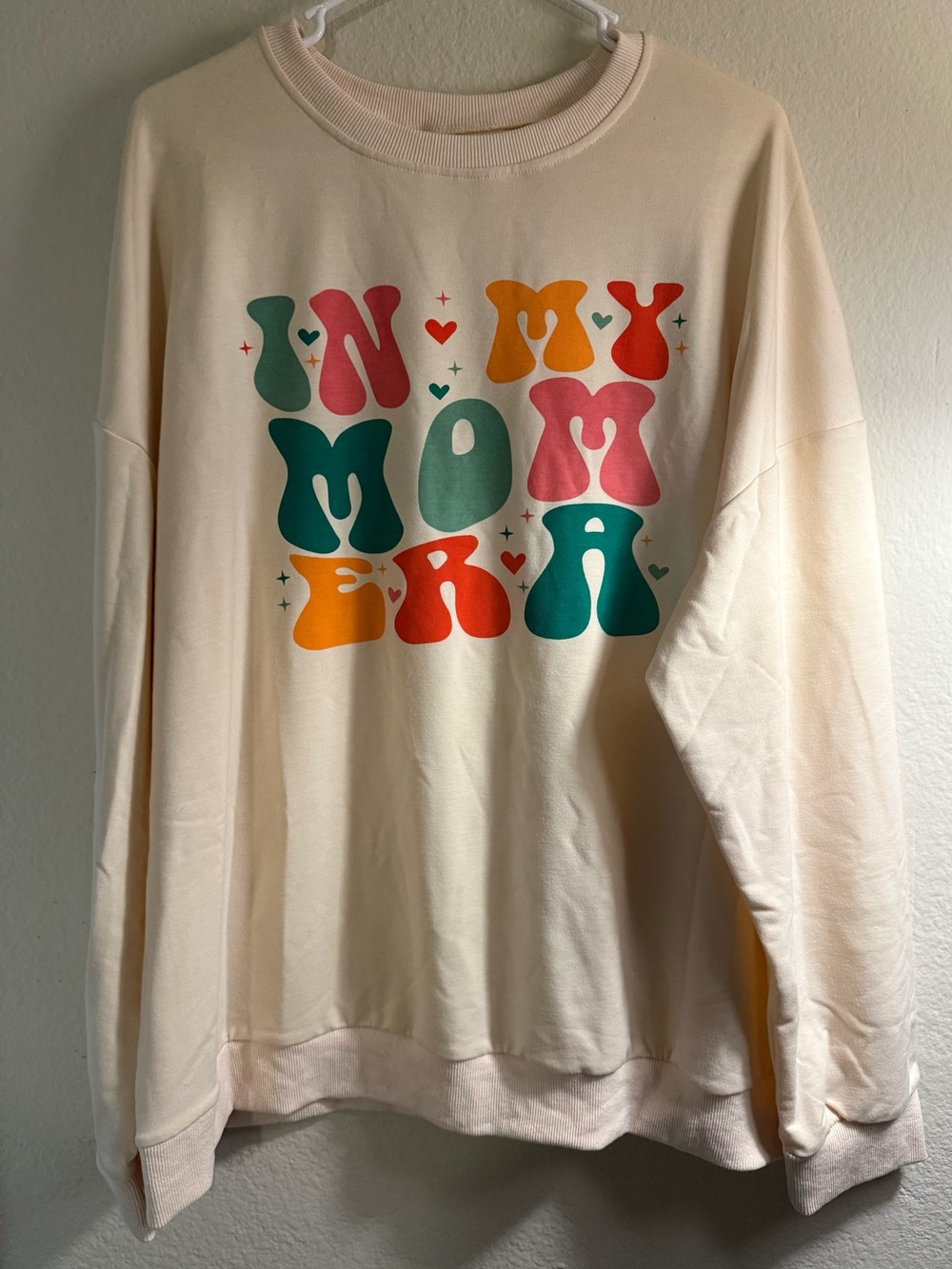 Cream Graphic Crewneck Sweatshirt with Retro Multi-Color Print